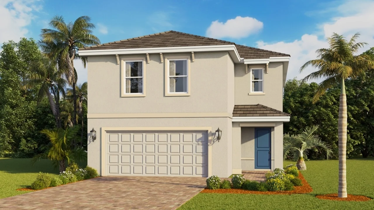 Outside of the Ellenton L home in Lakes of Estero. Two-story home with pavers driveway.